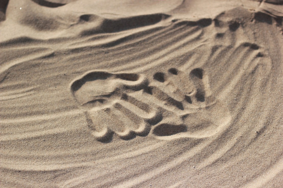 Kädenjälki hiekassa